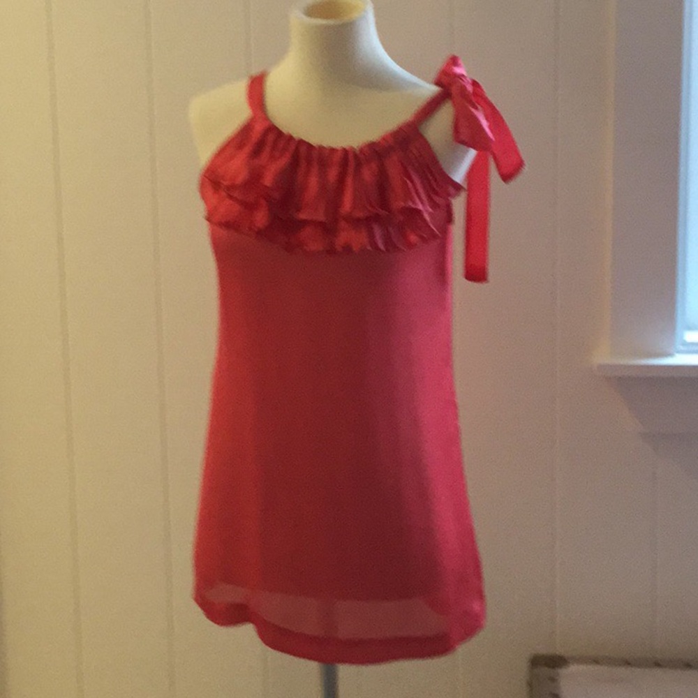 Stylish deep coral ruffle and bow tank